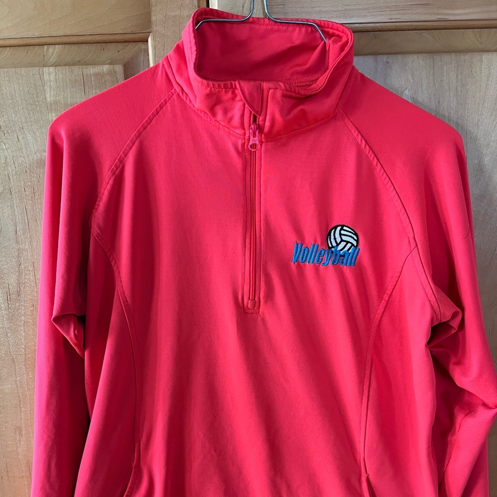 Volleyball pullover in vibrant pink.